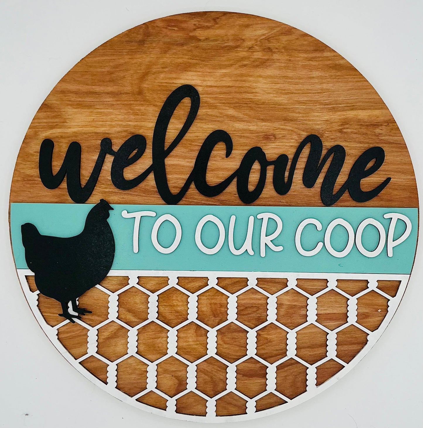 Wooden sign with 'welcome to our coop' text and chicken silhouette on a white background