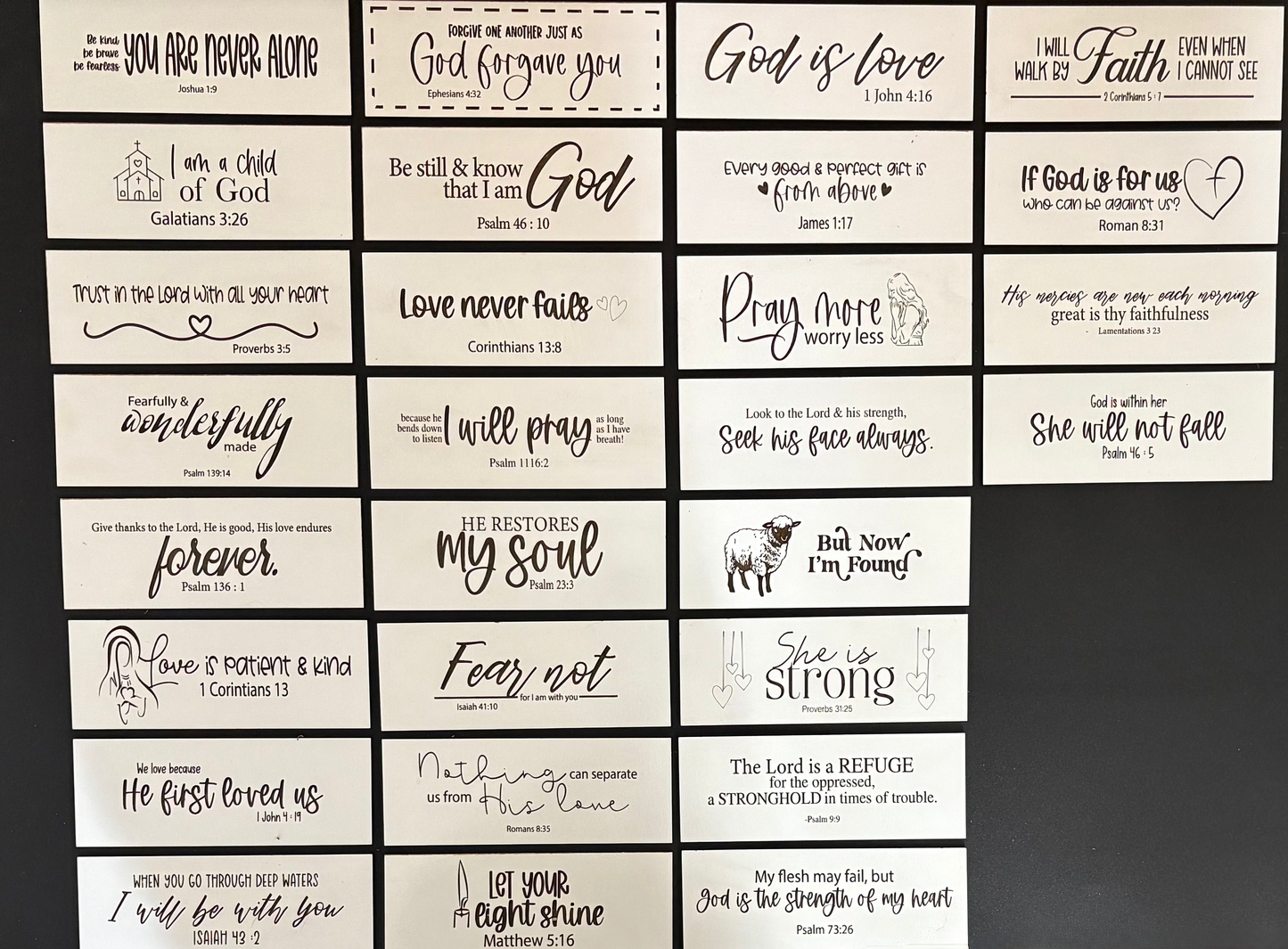 Collection of motivational and inspirational cards with various sayings on a black background