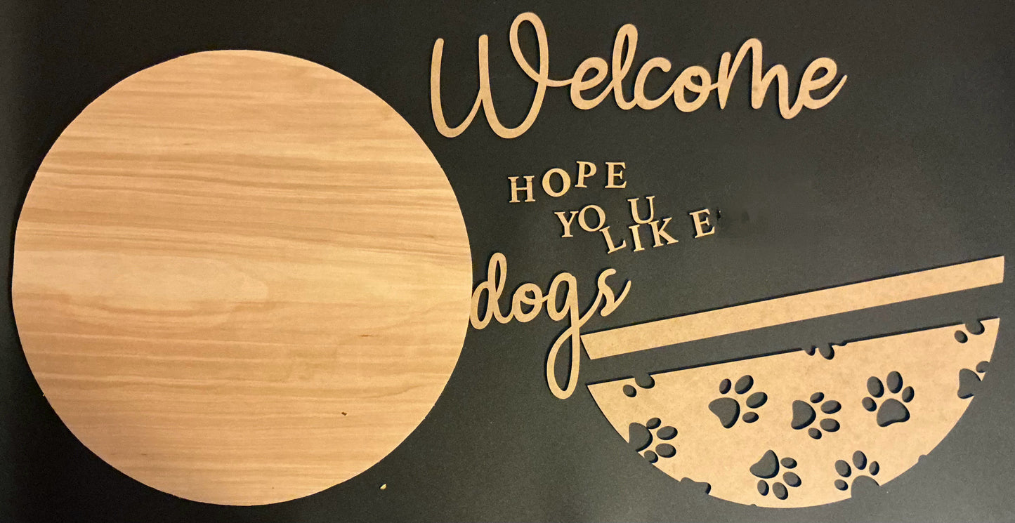 Decorative sign with 'Welcome Hope You Like Dogs' text on a black background