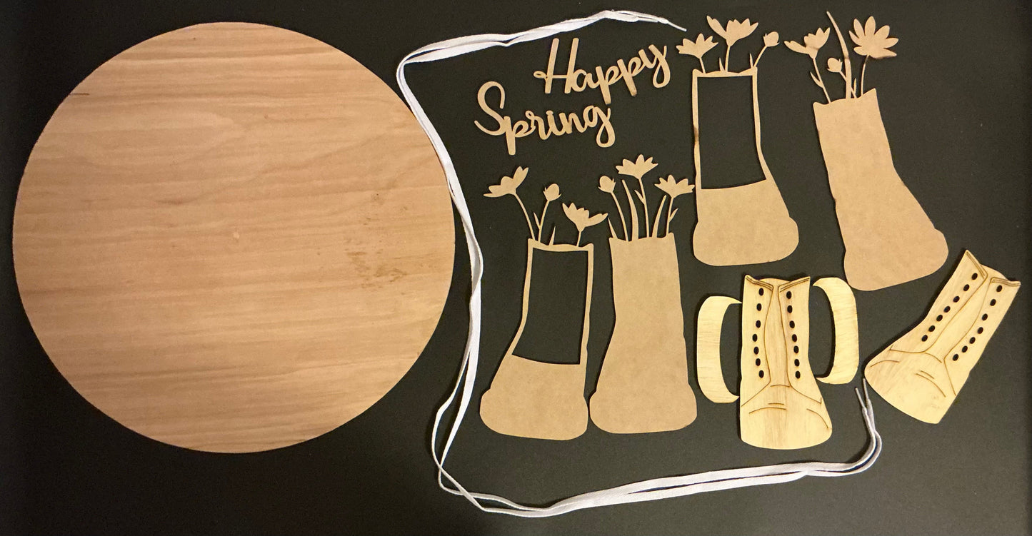 Decorative mat with 'Happy Spring' text and floral designs on a black background