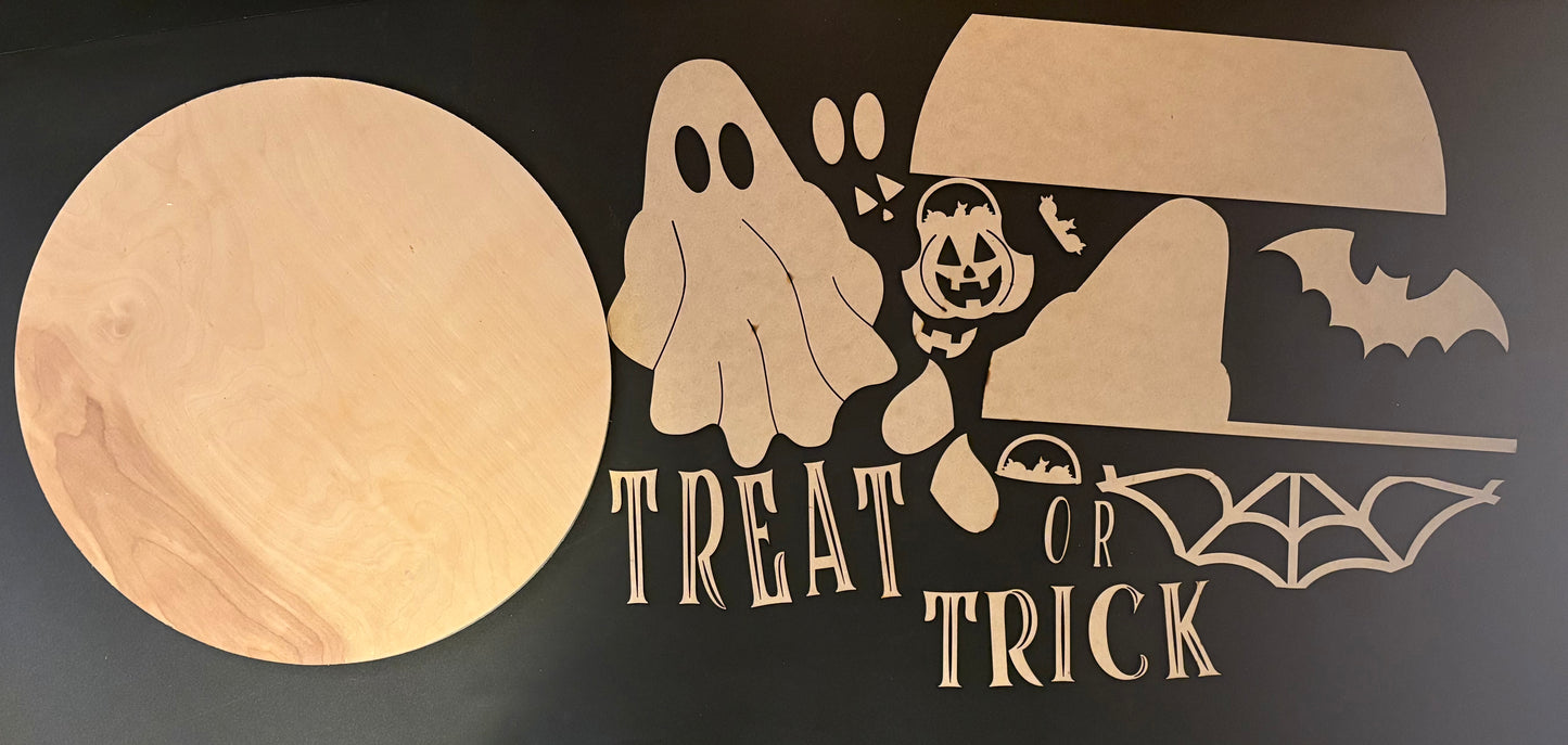 Decorative Halloween sign with ghost, pumpkin, and bats on a black background