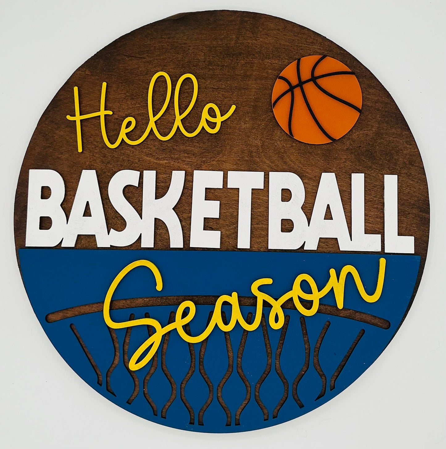 Decorative sign with 'Hello Basketball Season' text and basketball graphics on a wooden background.