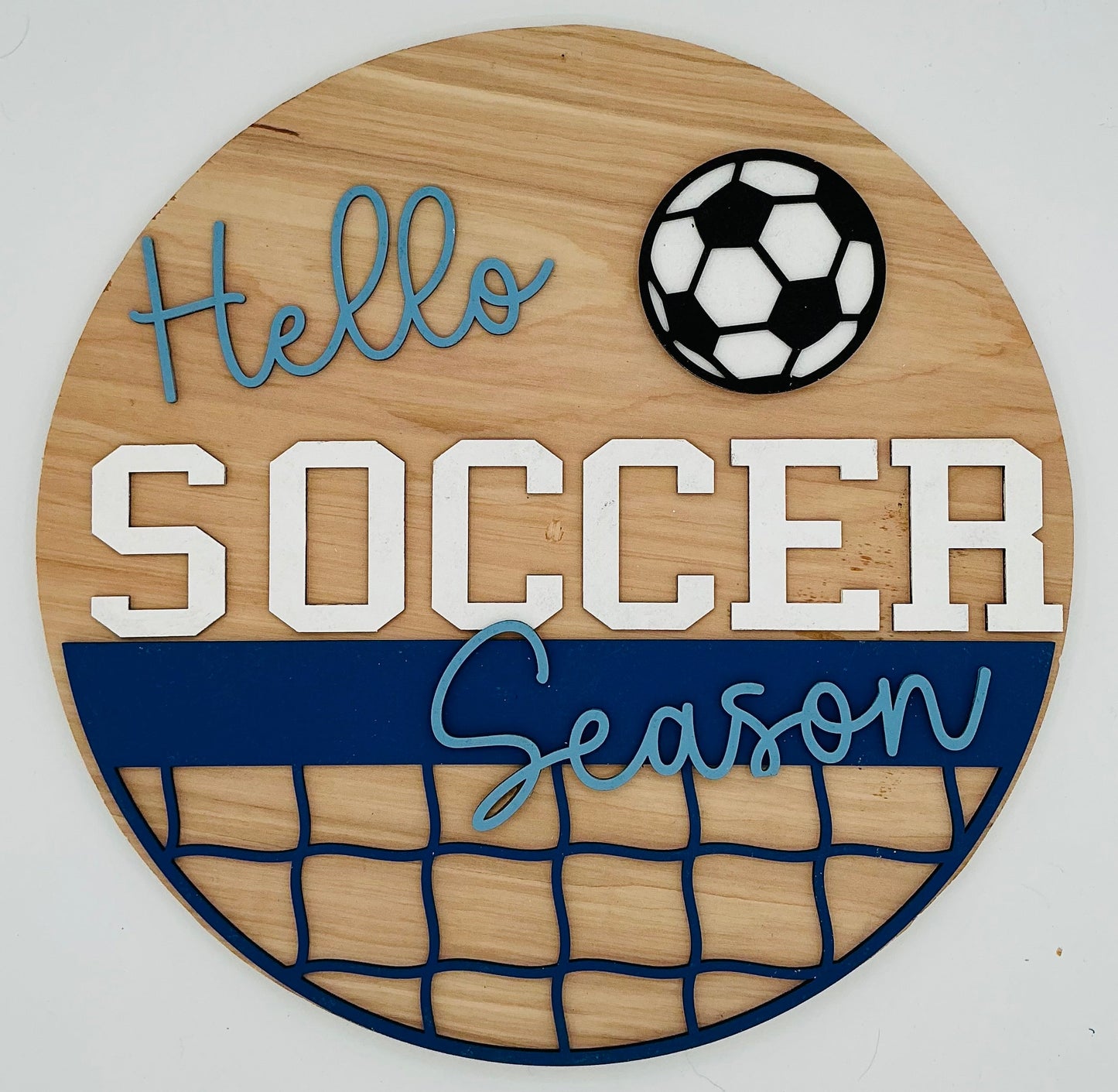 Wooden sign with 'Hello Soccer Season' text and a soccer ball graphic on a white background