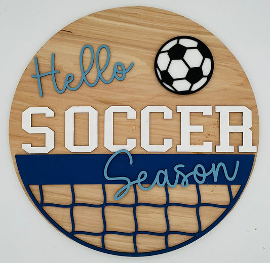 Wooden sign with 'Hello Soccer Season' text and a soccer ball graphic on a white background
