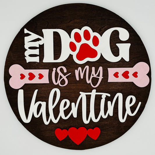 Round wooden sign with 'My Dog is my Valentine' text and paw print design.